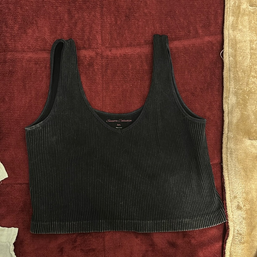 Black crop top , stretchy material. Could be use with some leggings